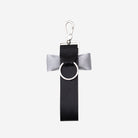The back of a Black and Silver Bow Keychain