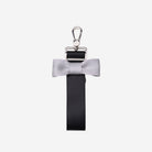The front of a Black and Silver Bow Keychain