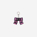 The front view of The Pink Agenda Pink Ribbon Bow Key Charm