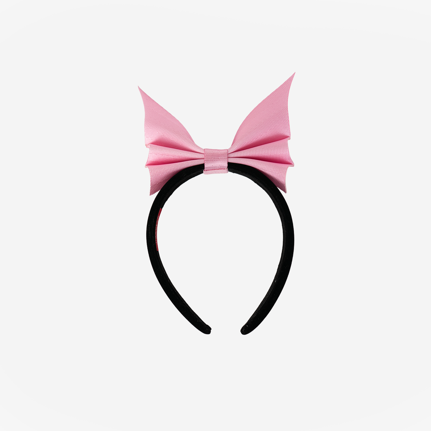 Front view of a Bat Headband in Petal Pink