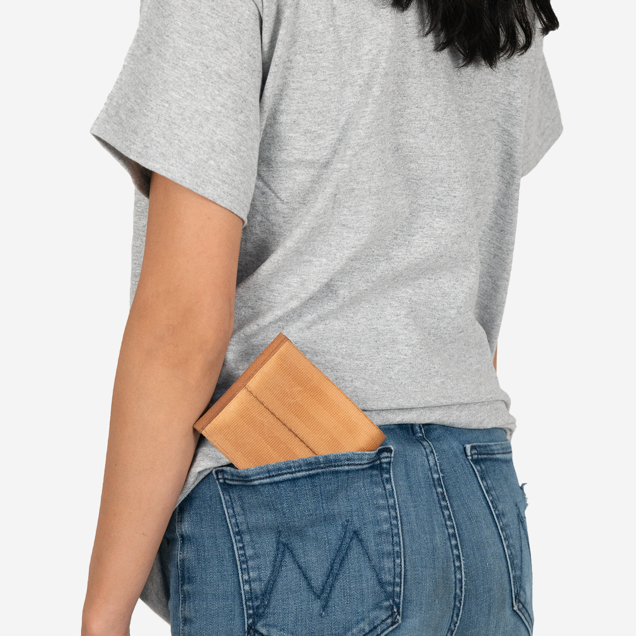 Billfold in Cognac in a models pocket