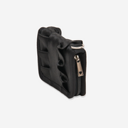 The side of a Black Lola Fun Size Wallet