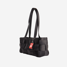 The side of a Black Satchel