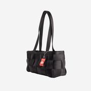 The side of a Black Satchel