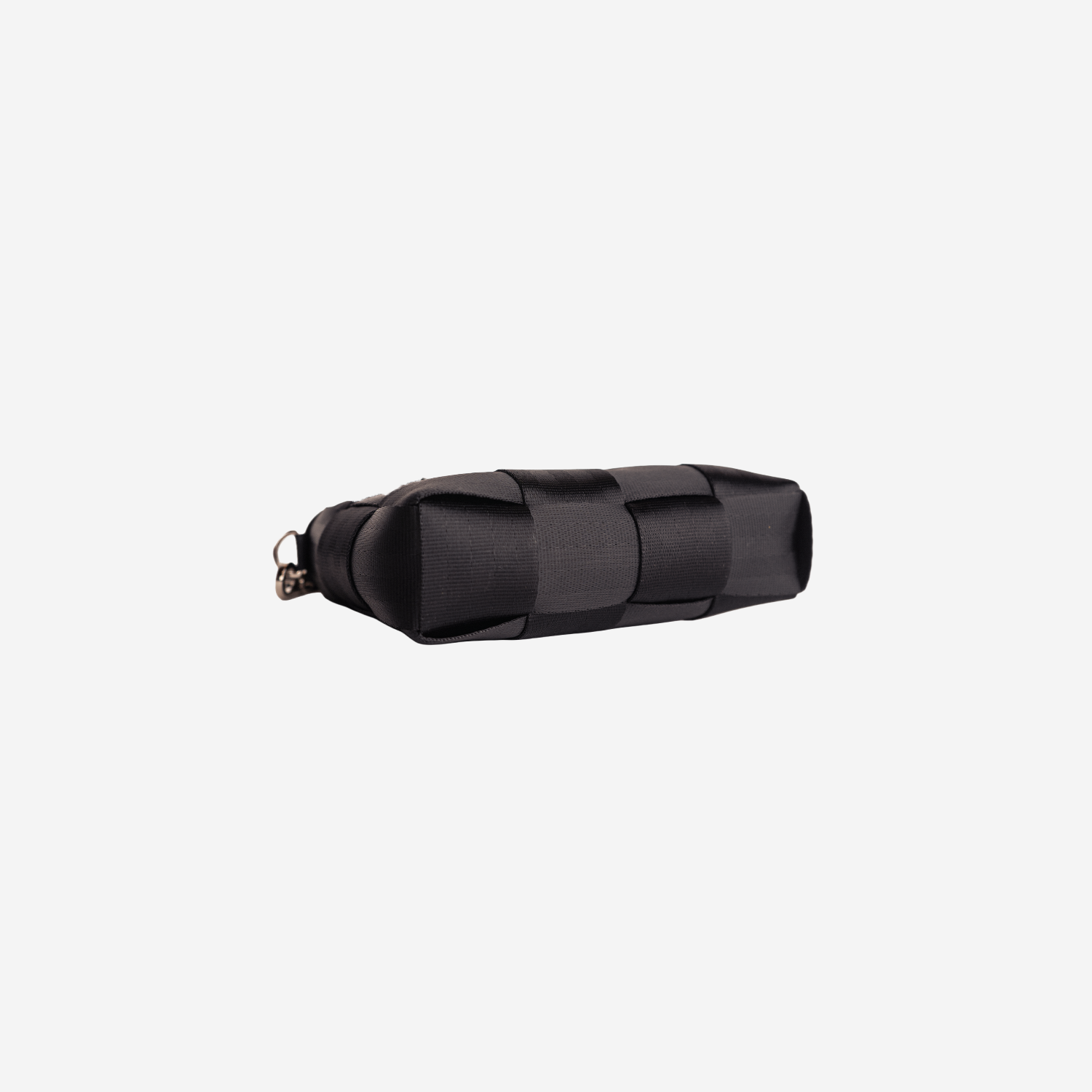 The bottom of a Black Woven Petite Tote