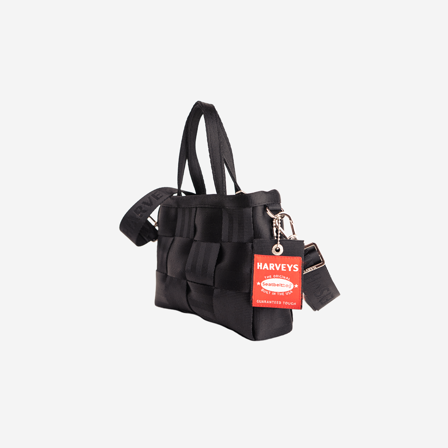 The side of a Black Woven Petite Tote