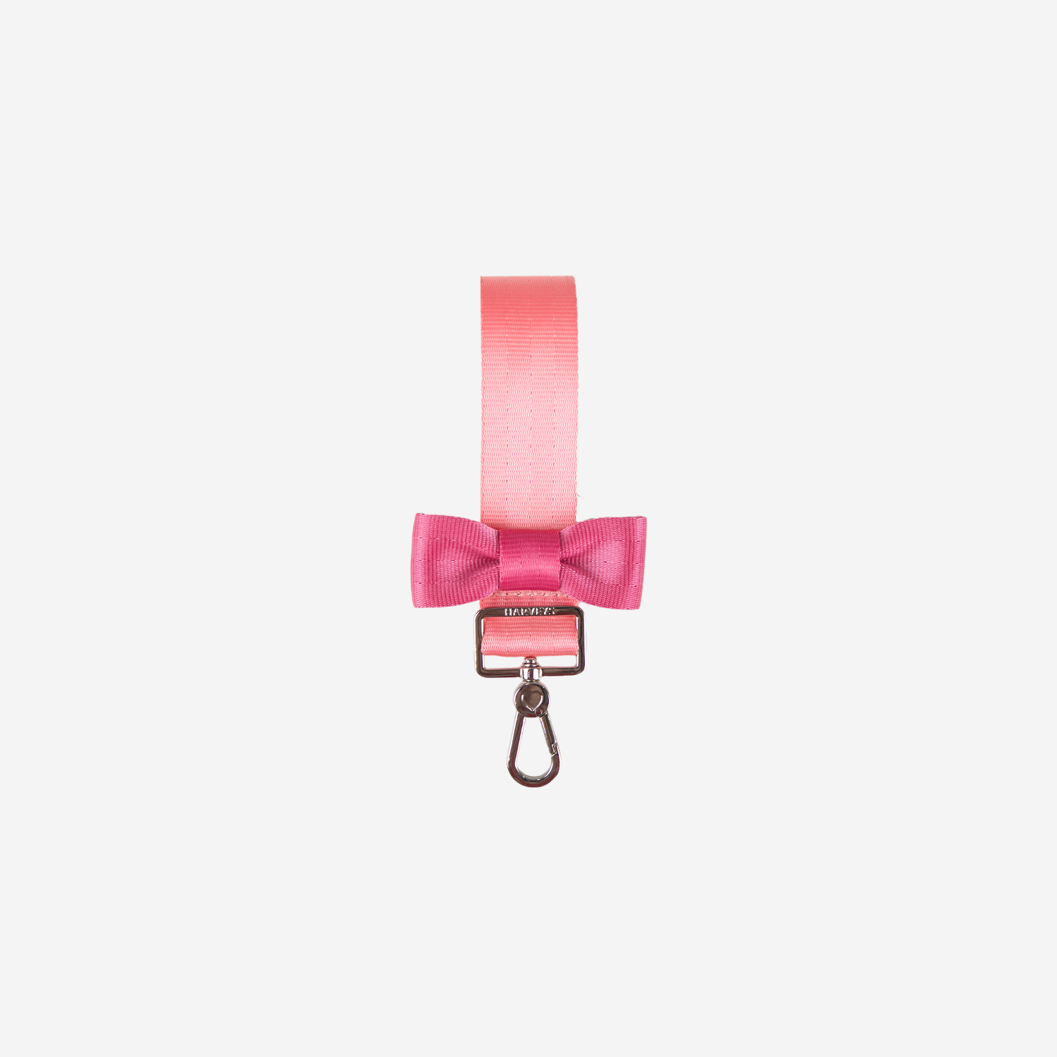 View of a Bow Keychain in the colorway Cotton Candy + Fuchsia