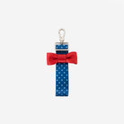 The front view of a Scarlet and Blue Dottie Bow Keychain