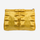 The front of a Buttercup Lola Bow Clutch