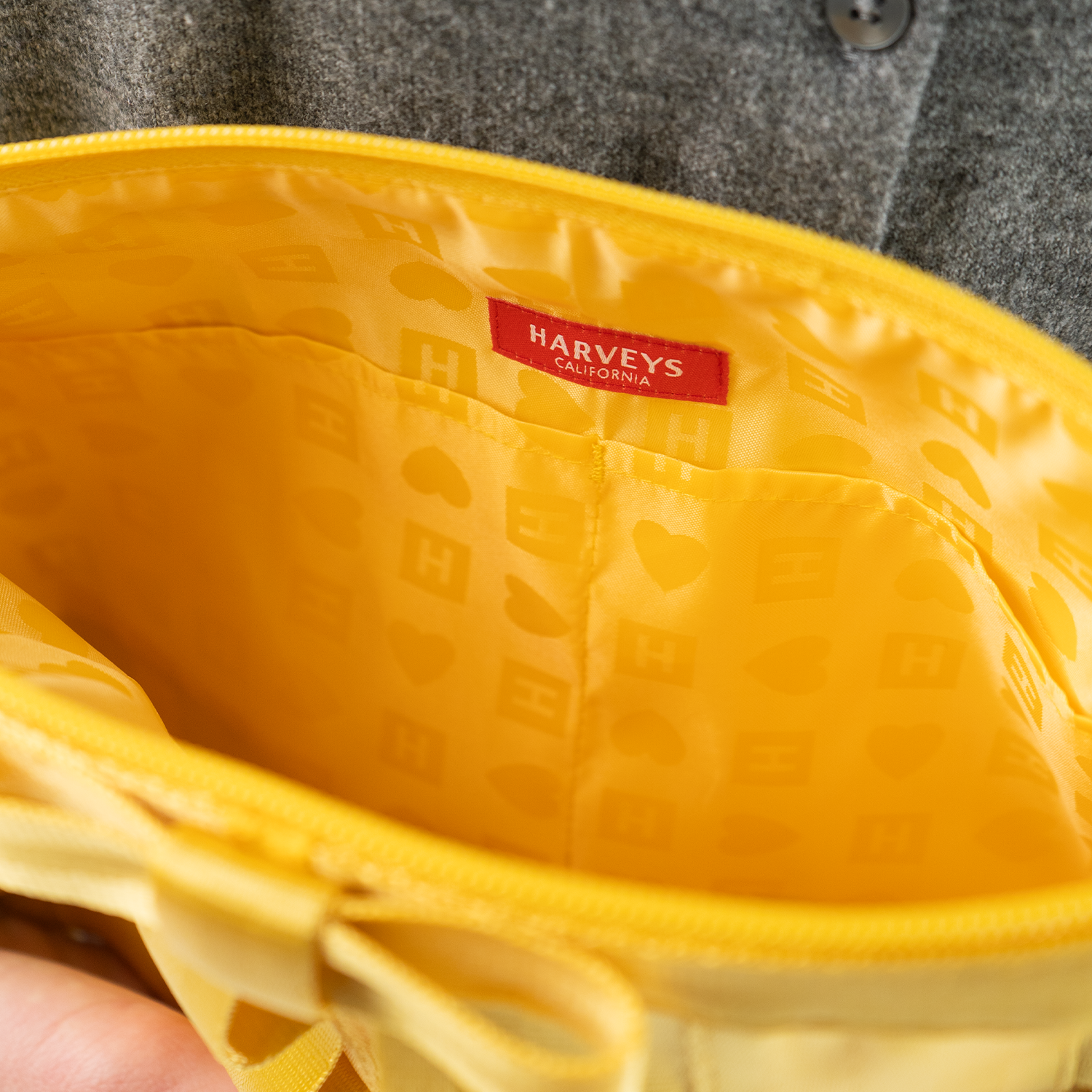 The inside of a Buttercup Lola Bow Clutch