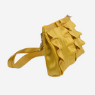 The side of a Buttercup Lola Bow Clutch