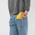 The Buttercup Lola Fun Size Wallet being held in a model's hand