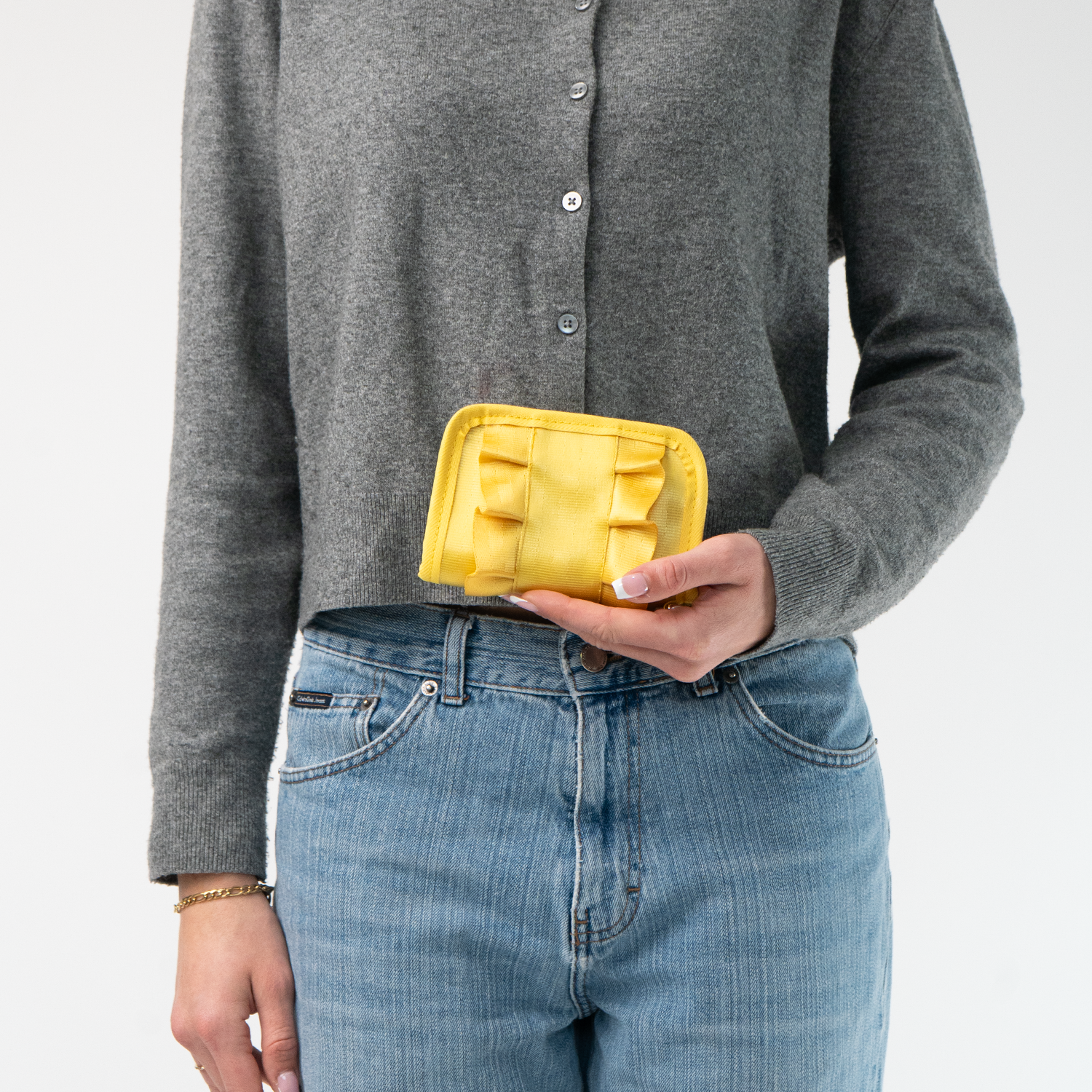 The Buttercup Lola Fun Size Wallet in a model's hand