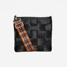 View of 5 panel  Click N Carry in Orange Tartan attached to black mini messenger