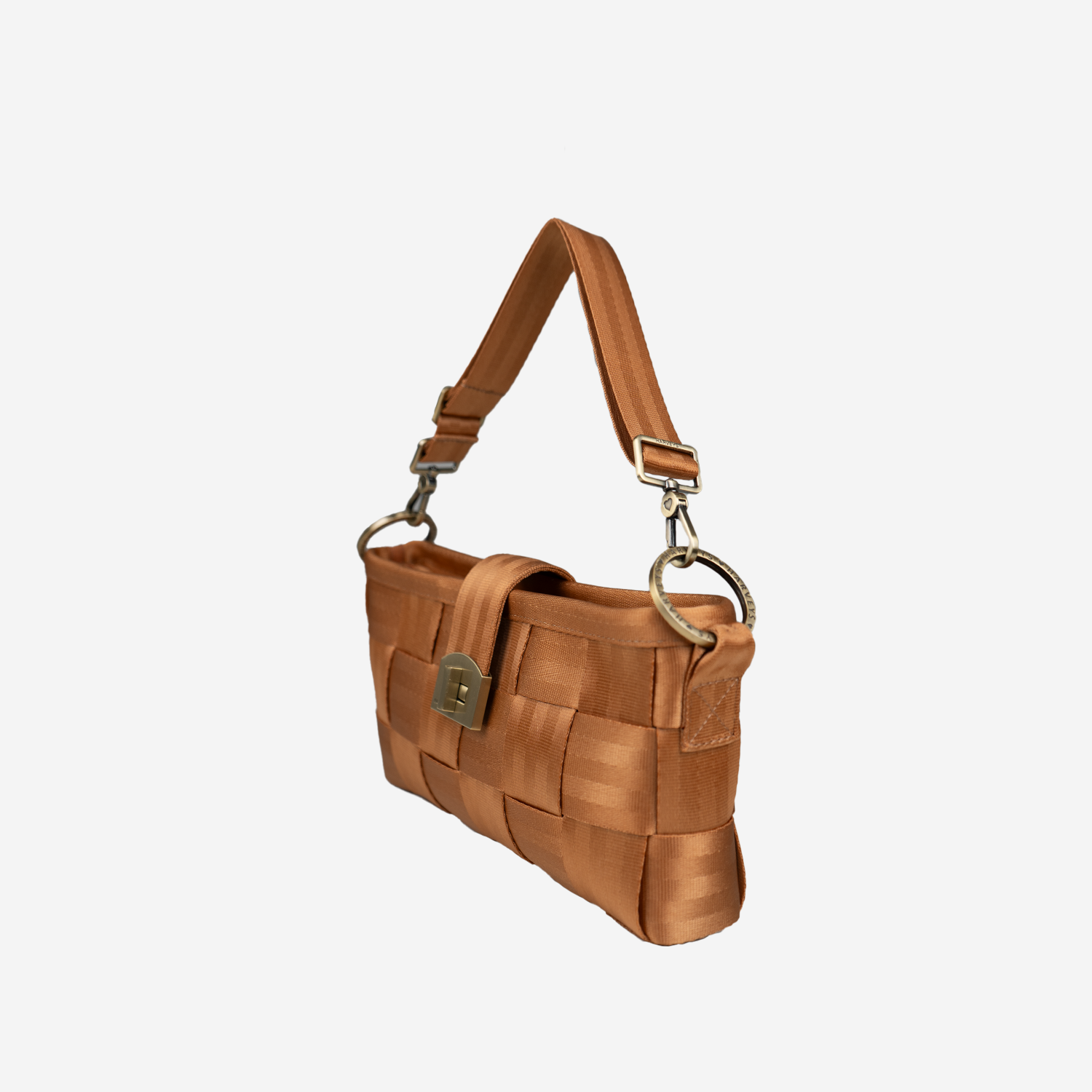Side view of a Carriage Ring Baguette in the color Cognac