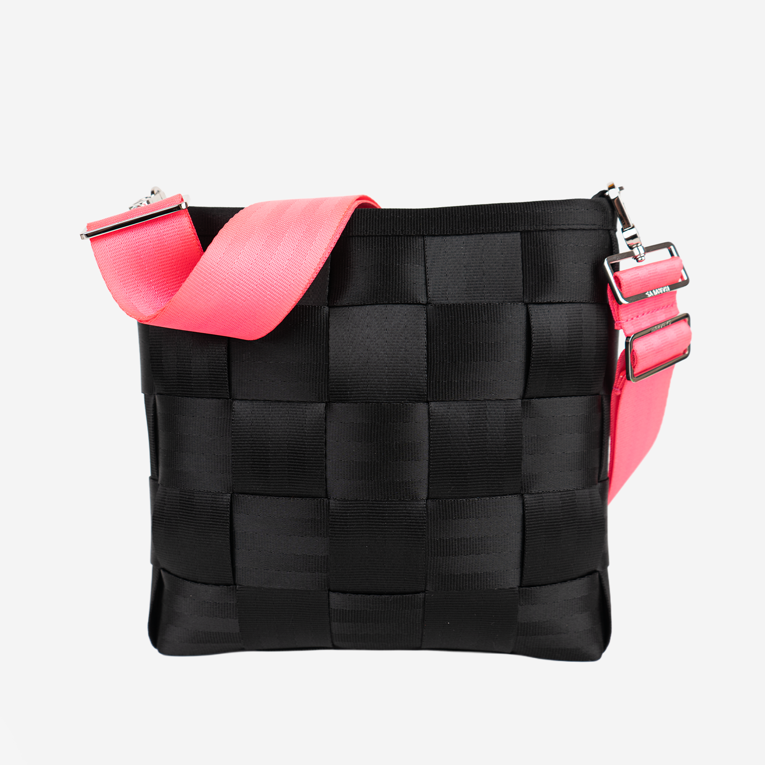 The 5 Panel Click N Carry in Dragonfruit being used on a bag