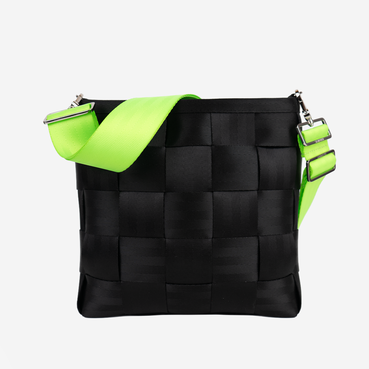The 5 Panel Click N Carry in Lime being used on a bag