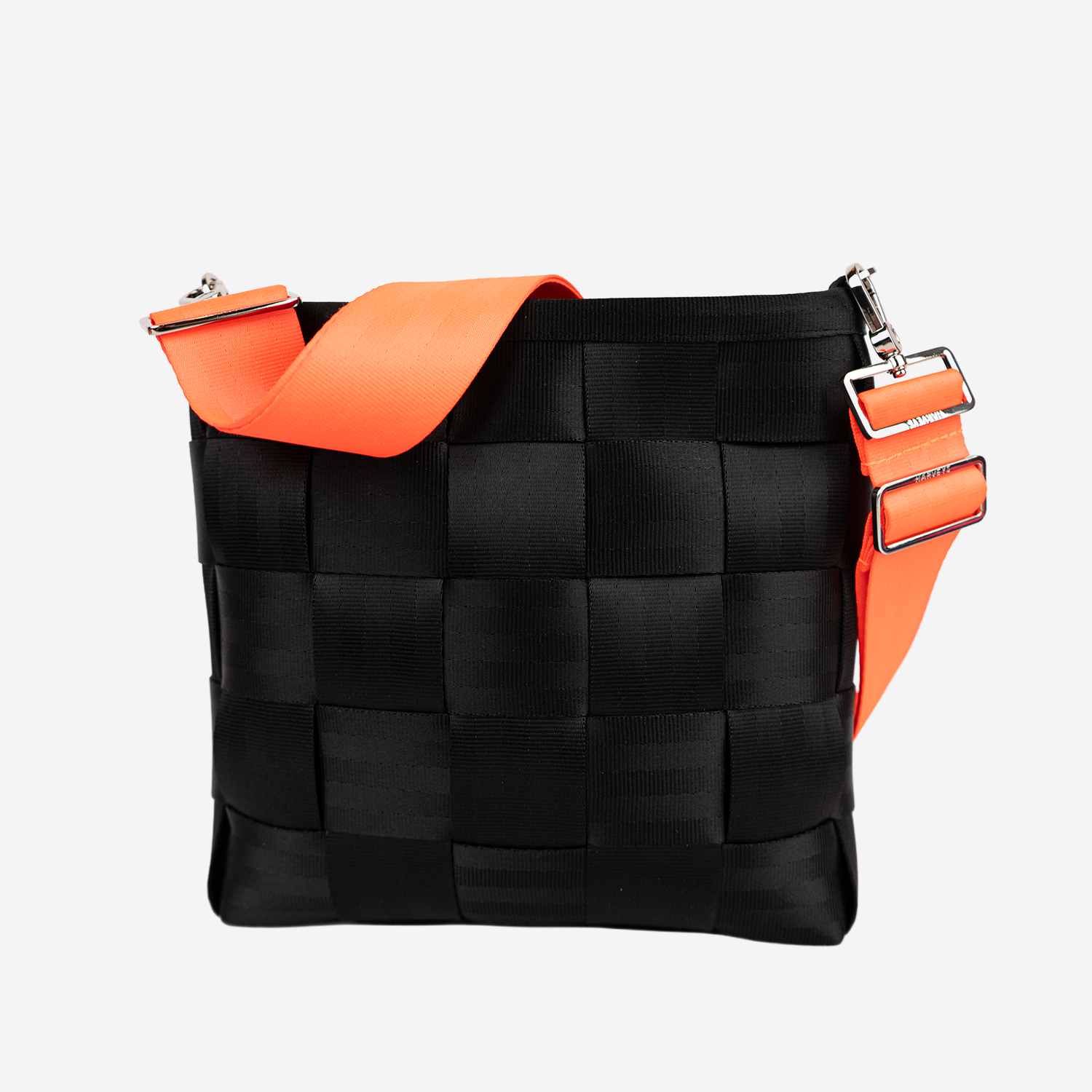 The 5 Panel Click N Carry in Poppy being used on a bag