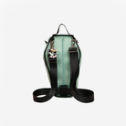 The back of a Coffin Convertible Crossbody in Mint