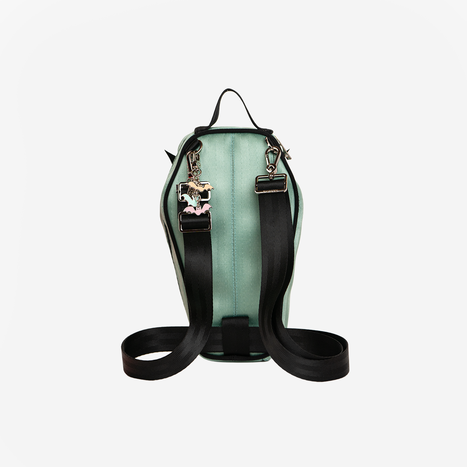 The back of a Coffin Convertible Crossbody in Mint