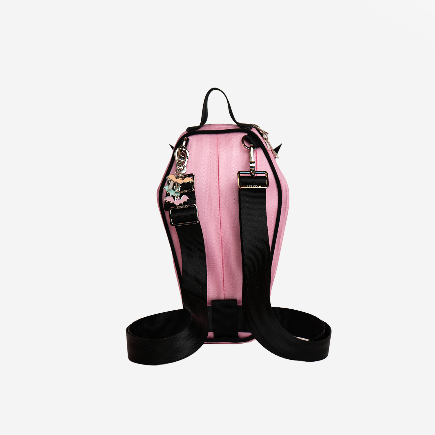 The back of a Coffin Convertible Crossbody in Petal Pink
