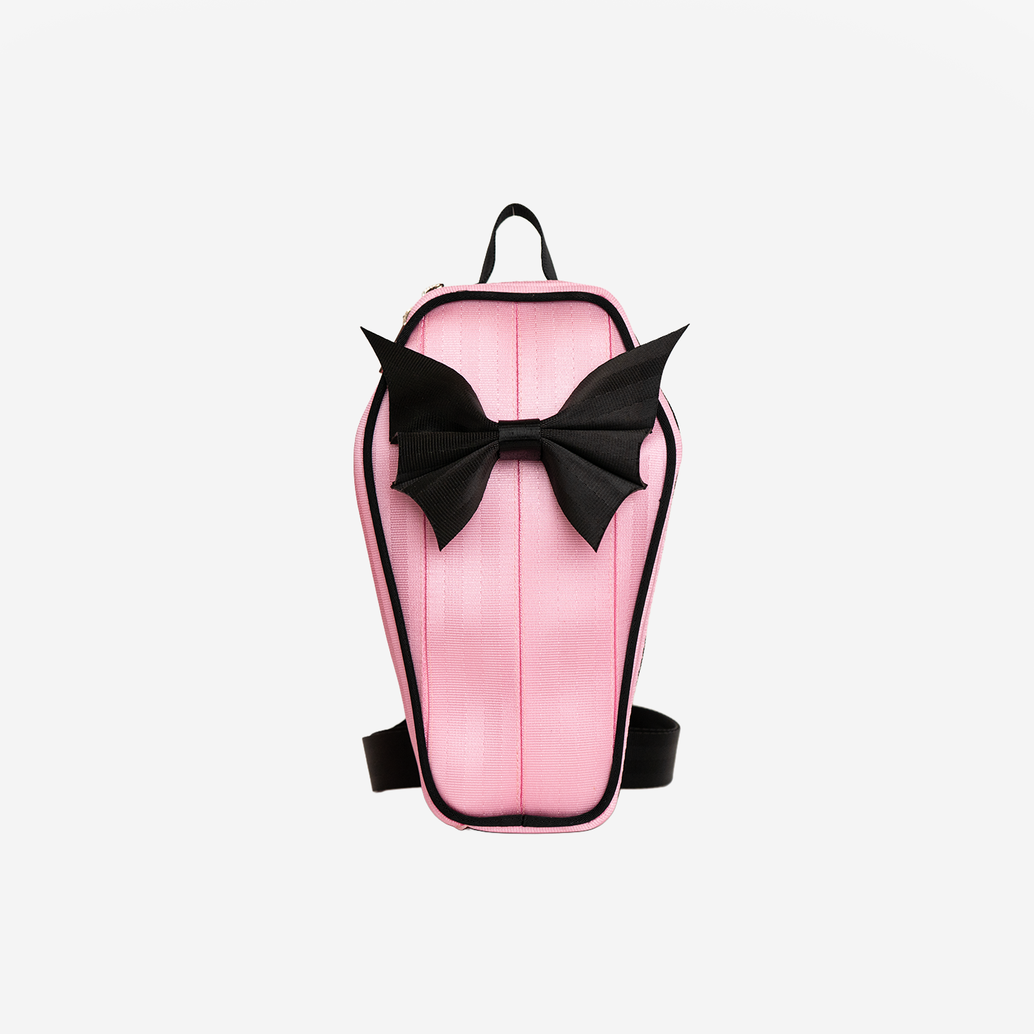The front of a Coffin Convertible Crossbody in Petal Pink