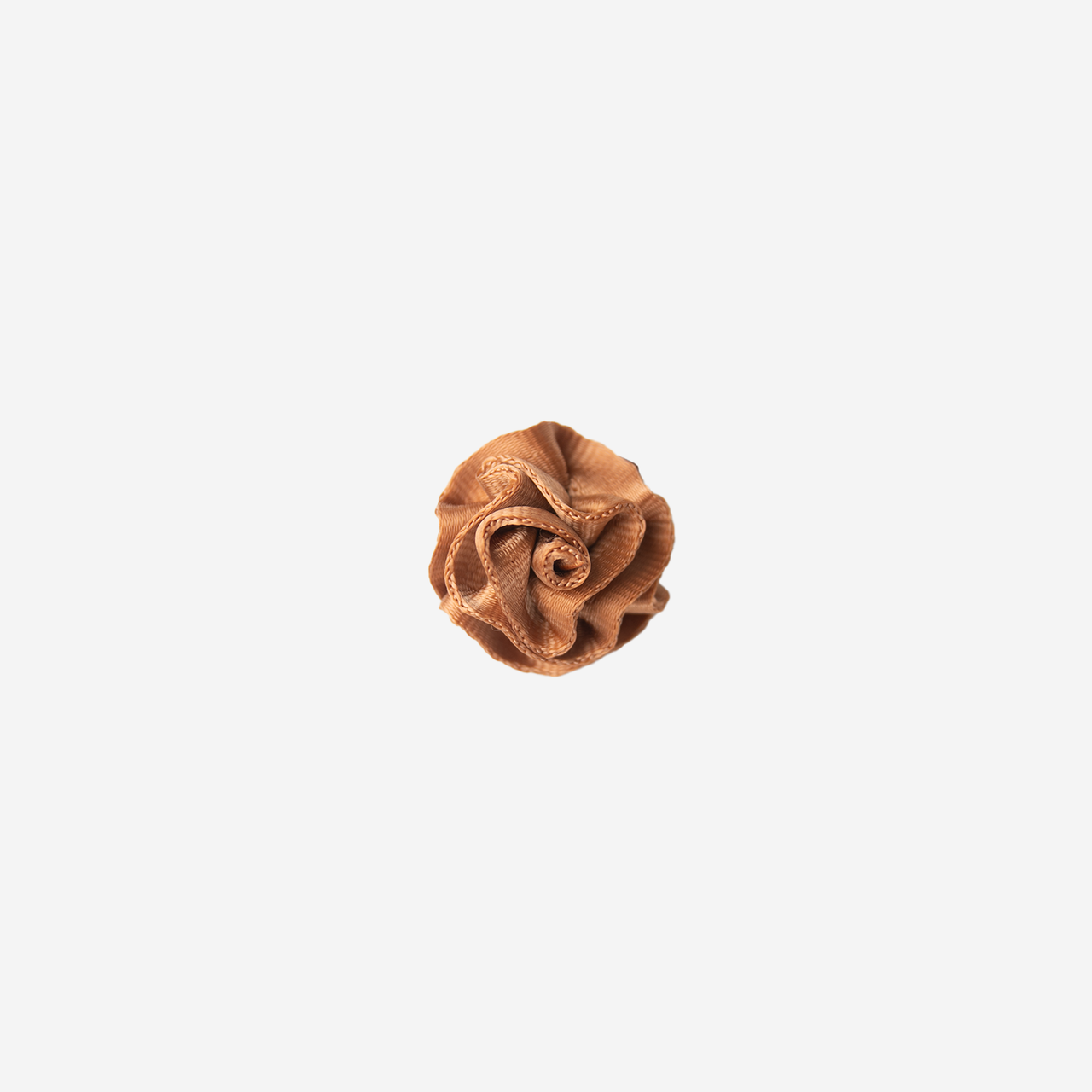 Front view of a Rosette Clip in the color Cognac