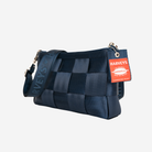 The side view of a Convertible Clutch in Indigo