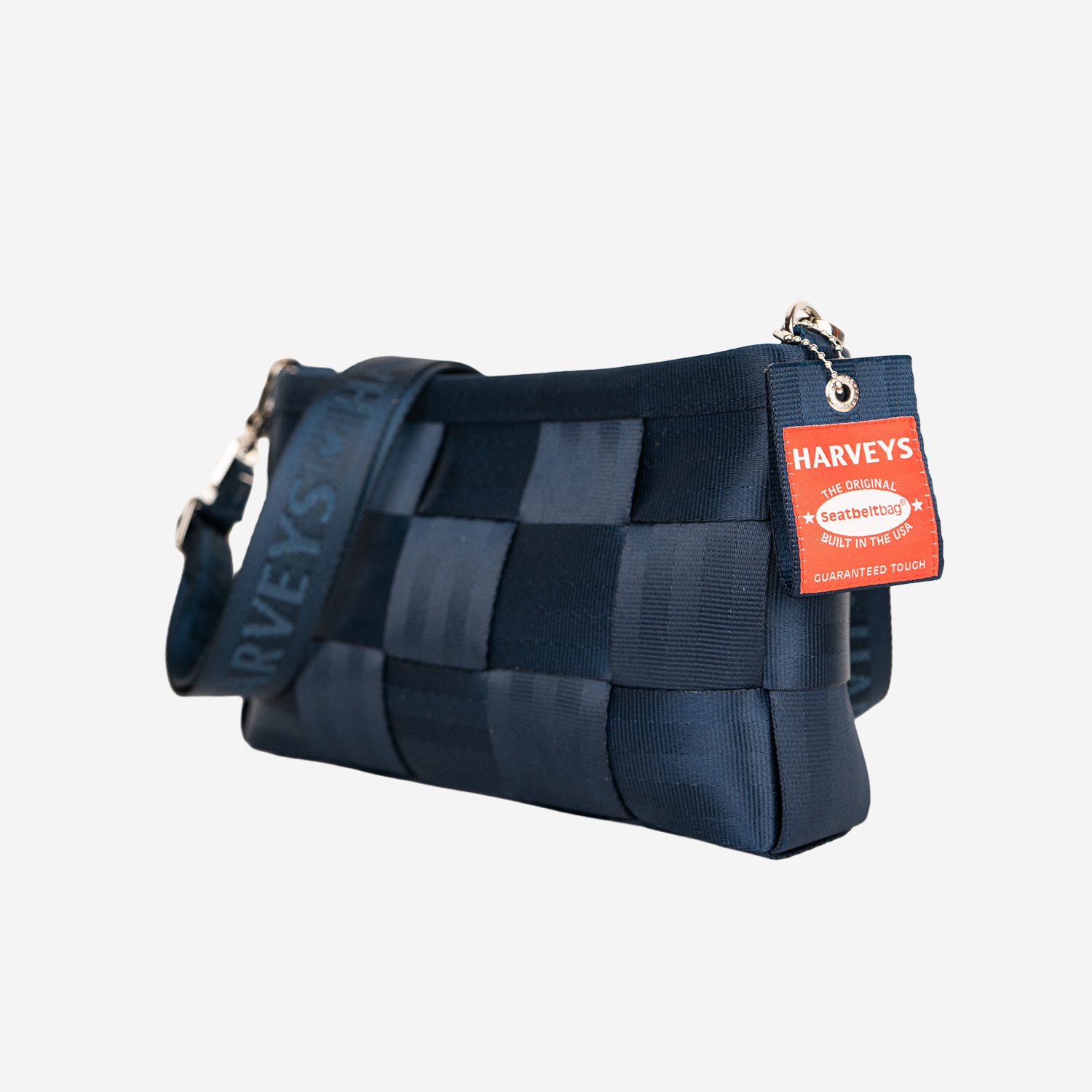 The side view of a Convertible Clutch in Indigo
