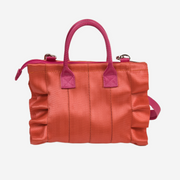 The front of a Coral N Fuchsia Lolita