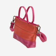 The side of a Coral N Fuchsia Petite Tote