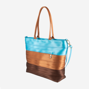 Side view of a Desert Sky Medium Streamline Tote