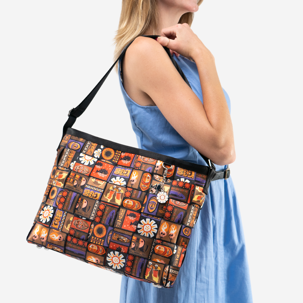The Shag Tiki Tapa Executive Messenger being worn by a model