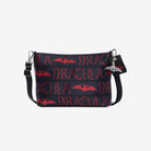 Front view of black clutch with red Dracula and bat lettering and silver bat charm