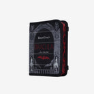 Front + side view of black crossbody book shaped bag