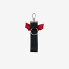 back view of black keychain with red bat shaped bow