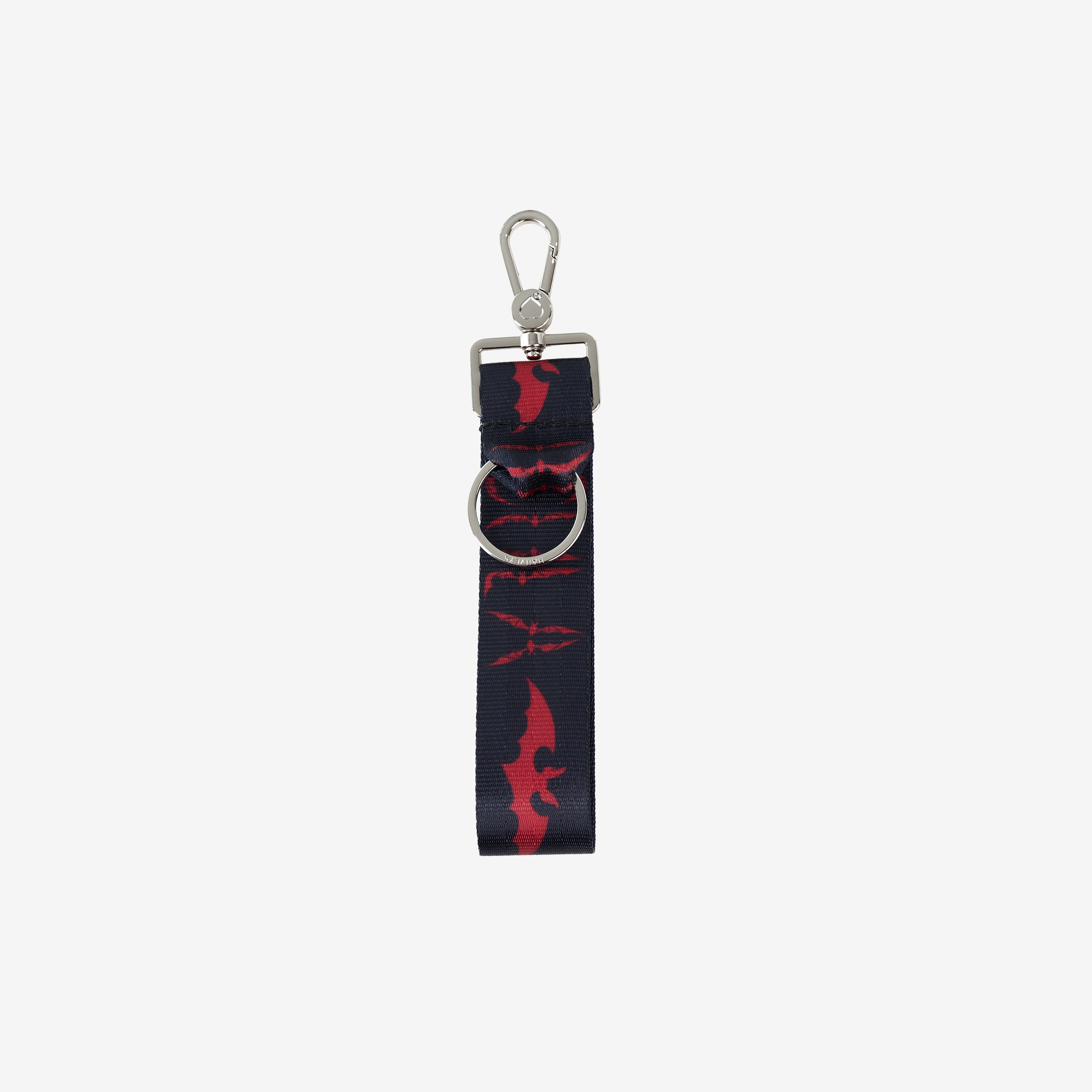 back view of key chain with Dracula and bat red print