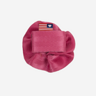 The velcro loop back of the Fuchsia Rosette