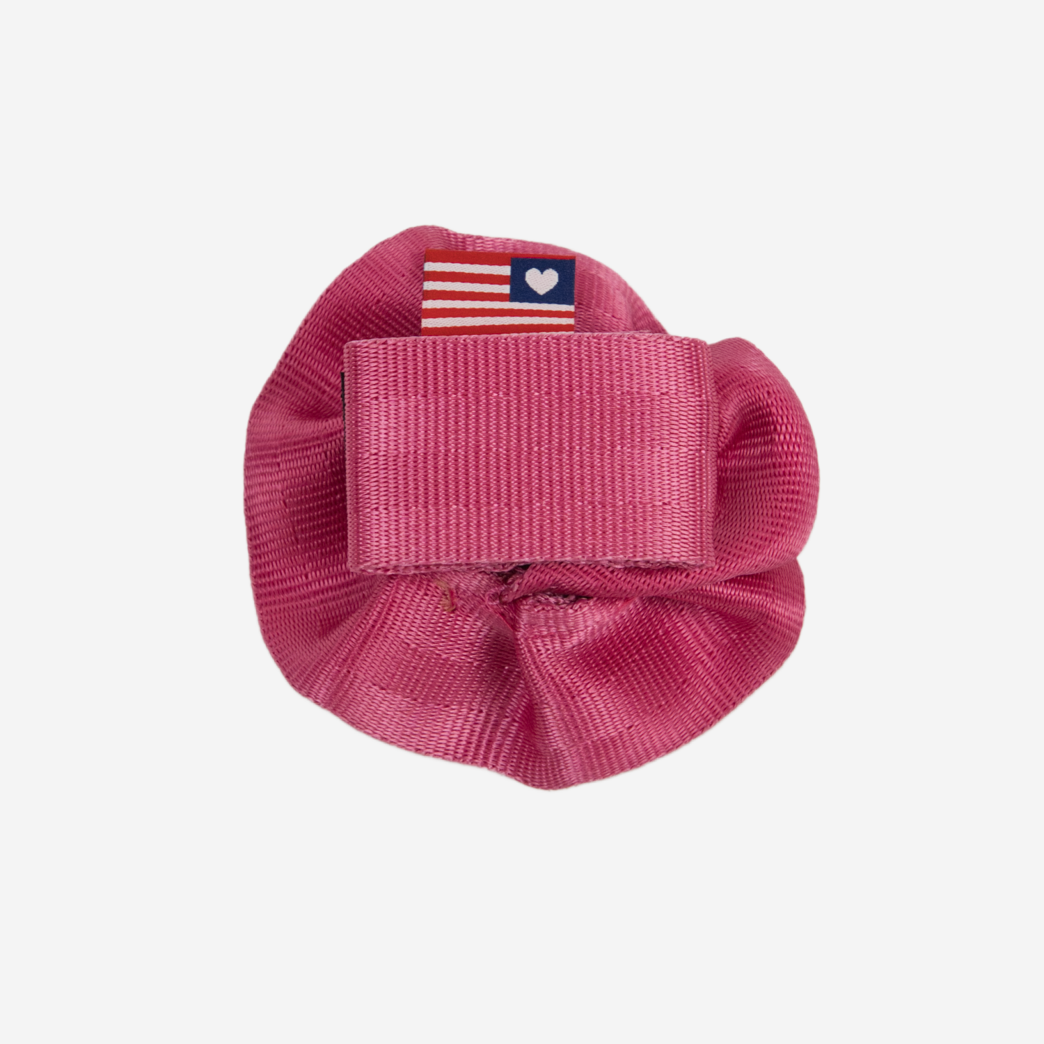 The velcro loop back of the Fuchsia Rosette