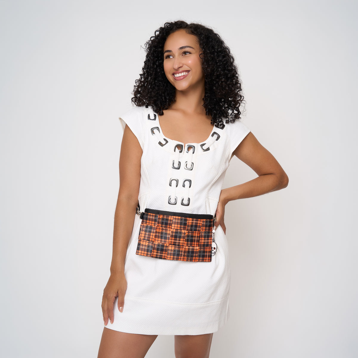 Model wearing Hip Pack in Orange Tartan on waist