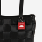 The Hangtag detail on a Large Tote in Black