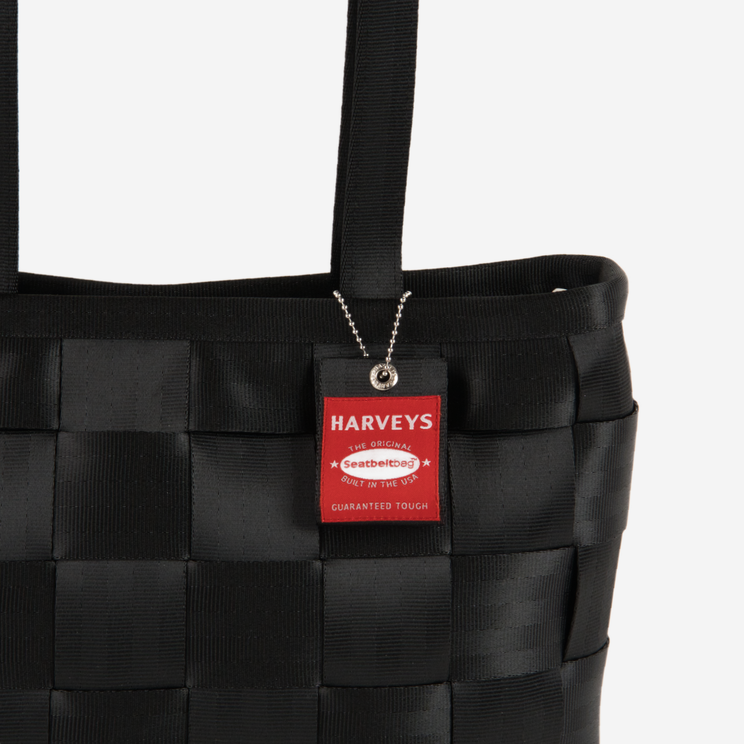 The Hangtag detail on a Large Tote in Black