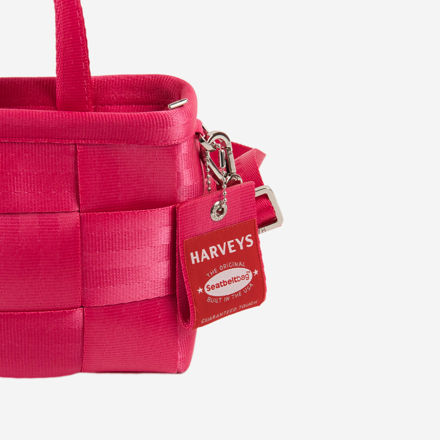 Detailed view of a Woven Petite Tote in Melon