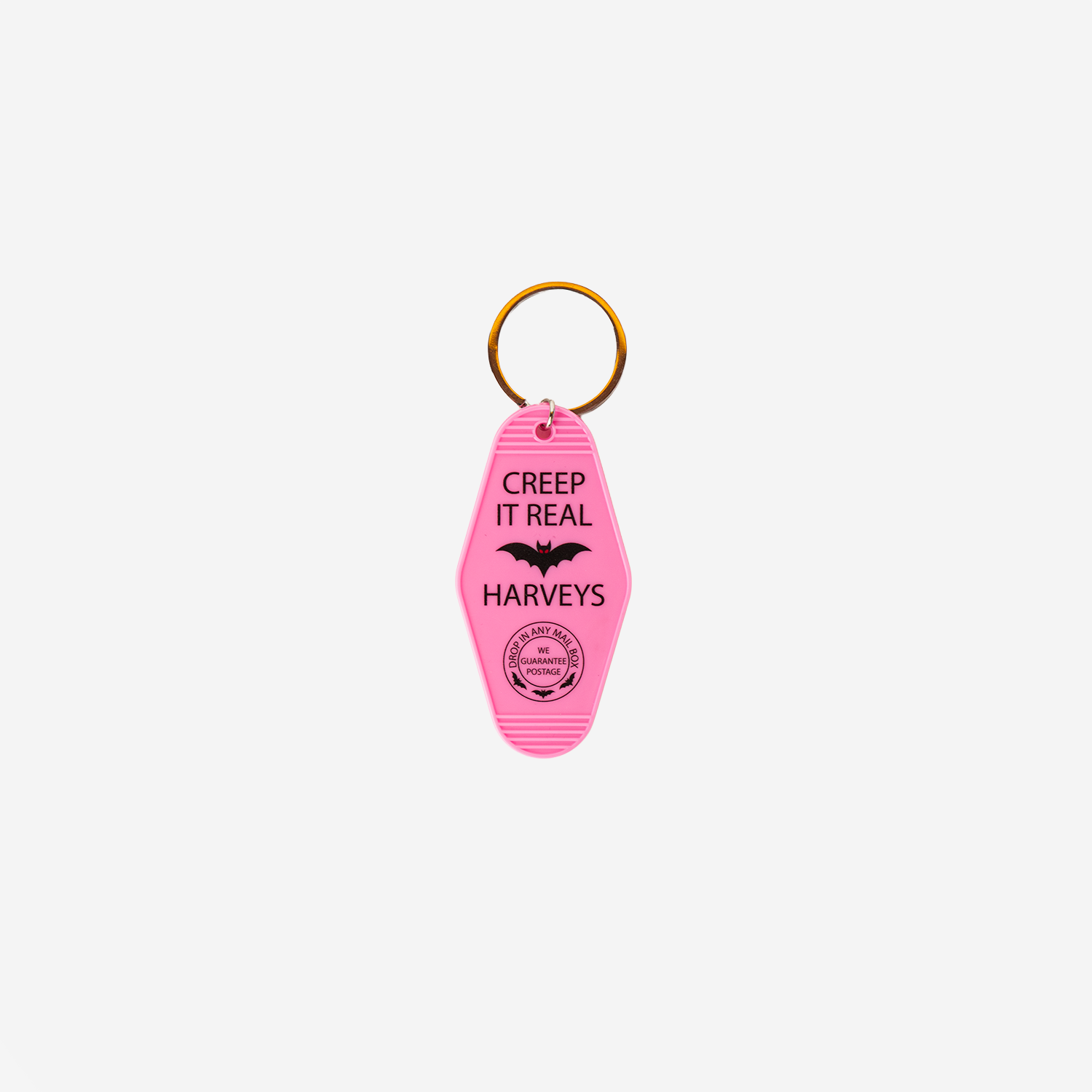 The front of a Creep It Real Hotel Key Tag