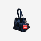 Side view of a Woven Petite Tote in Indigo