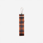 Front view of 4 panel key chain in orange tartan