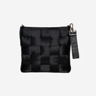 The Black Widow 4 Panel Keychain on a bag