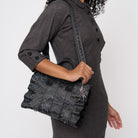 A model wearing a Black Widow Lolita