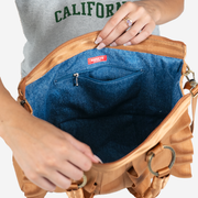 Interior view of a Lola Satchel in Cognac