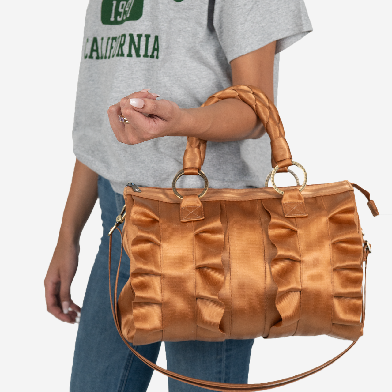 Lola Satchel in Cognac on a models arm